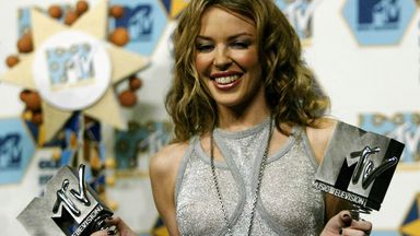 Kylie Minogue with two awards - best pop and best dance artist - at the MTV Europe Music Awards in Barcelona in November 2002